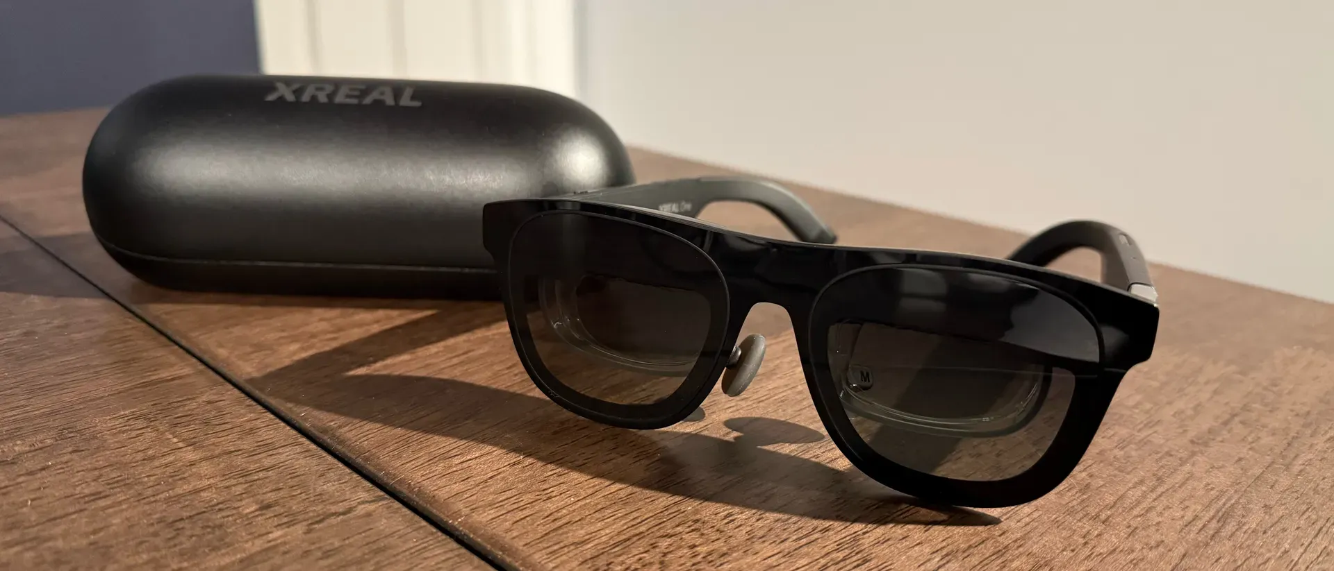 XREAL 1S AR glasses displayed in a modern setting